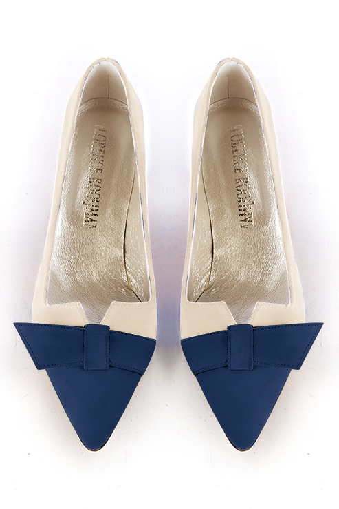 Navy blue and champagne beige women's dress pumps, with a knot on the front. Tapered toe. Medium spool heels. Top view - Florence KOOIJMAN